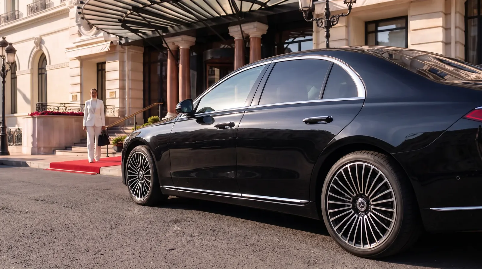 AI-generated hospitality concept with a Mercedes outside an elegant hotel.
